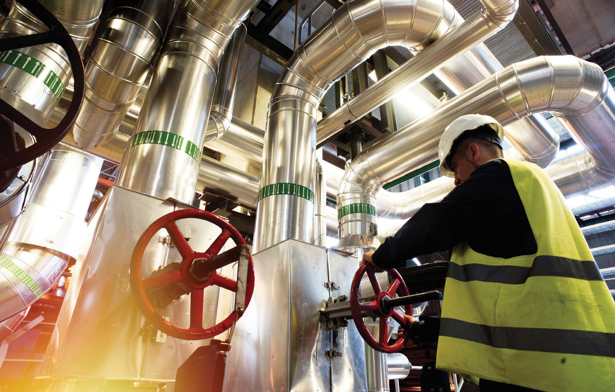 Dupill Group technician servicing a valve in the field