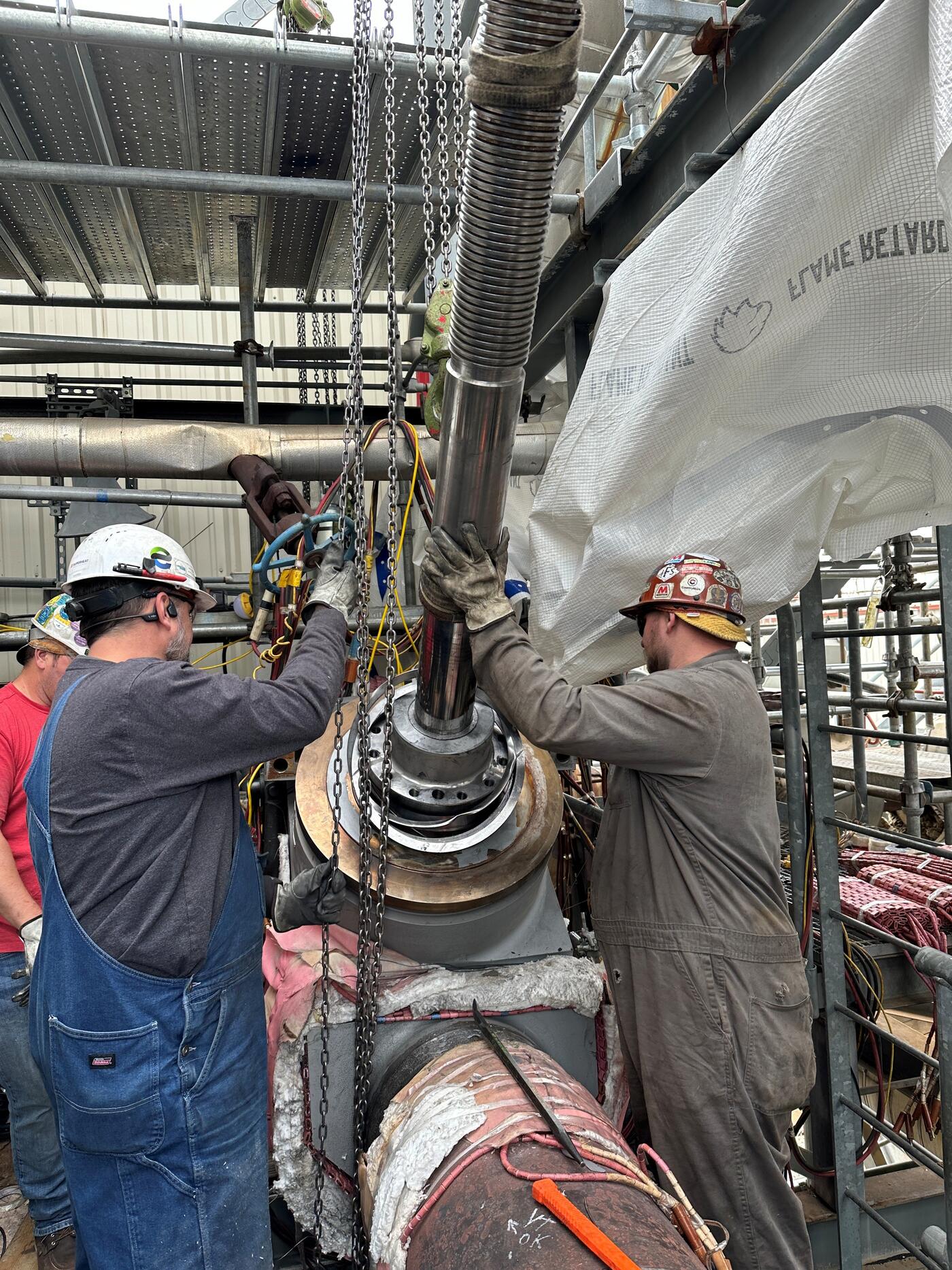 Dupill Group crew rigging a valve assembly for repair